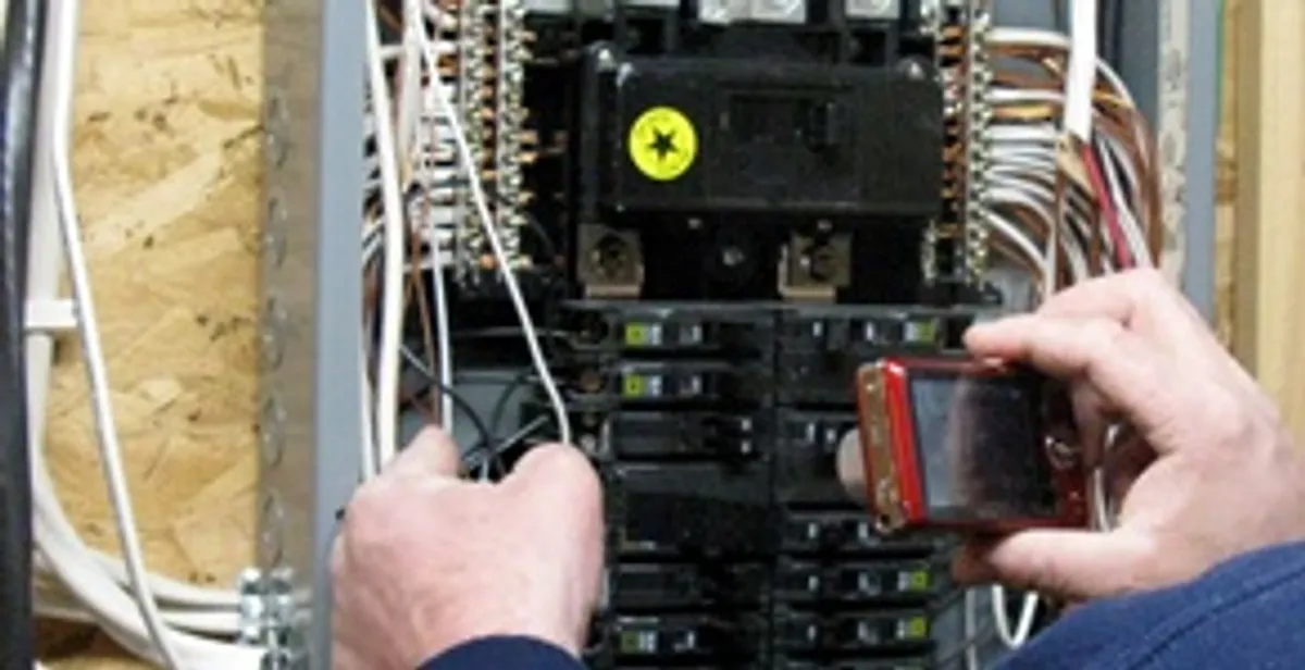 Home electrical inspection of circuit breaker panel by licensed electrician in Richmond, VA