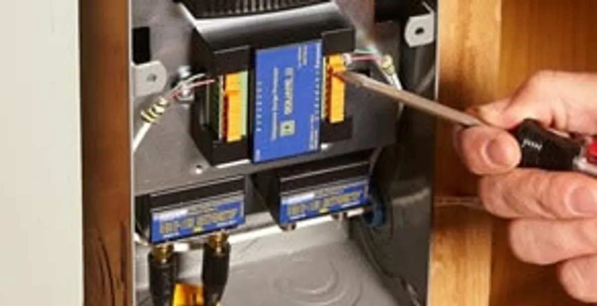 Whole home surge protection device being installed by a licensed electrician to protect electrical systems in Richmond, VA